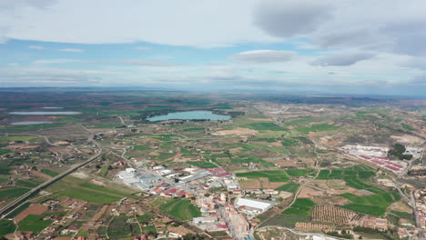 Aerial-view-Alcaniz-San-Jorge-studying-center-Spain-cloudy-day-fields-rural-city